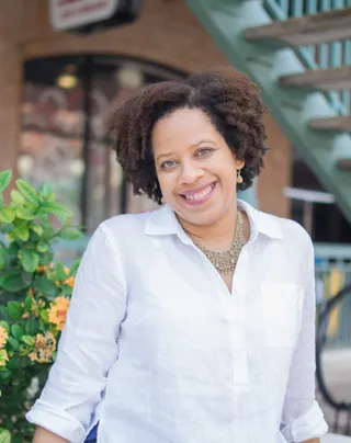Francine Sinclair, Florida Notary Public and Loan Signing Agent, smiling outdoors in Tampa